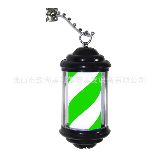 Mini wall light for hair salon, barber shop pole with elegant design and black structure.
