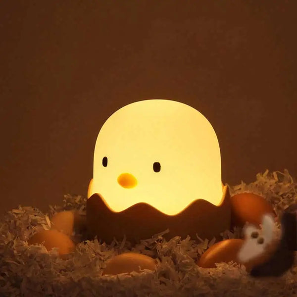 Cute silicone lamp in the shape of a chicken in an eggshell