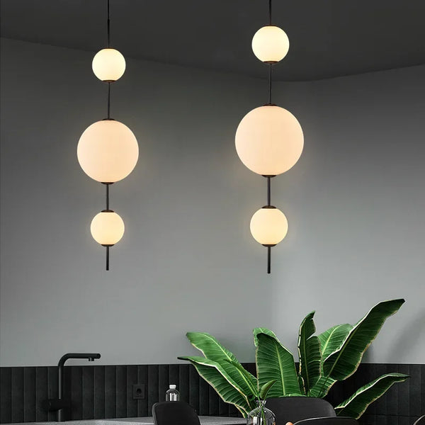 Modern LED pendant light with white glass sphere, interior decoration accessory