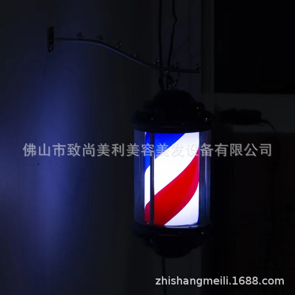 Mini wall light for hair salon, barber shop pole with elegant design and black structure.