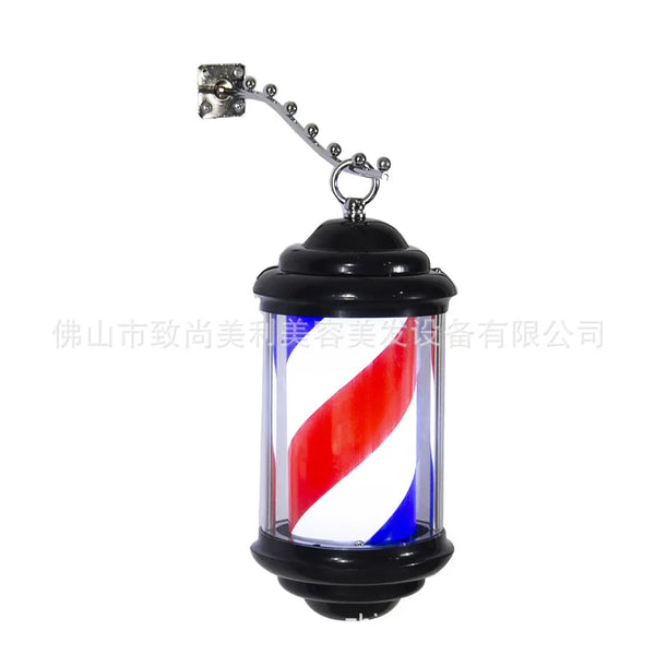 Mini wall light for hair salon, barber shop pole with elegant design and black structure.