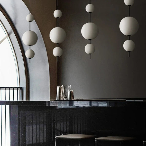 Modern LED pendant light with white glass sphere, interior decoration accessory