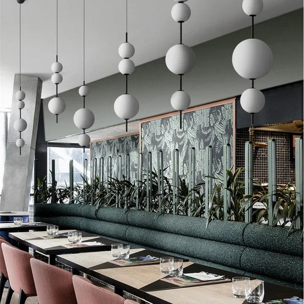 Modern LED pendant light with white glass sphere, interior decoration accessory