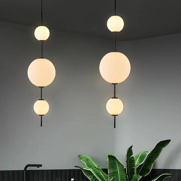 Modern LED pendant light with white glass sphere, interior decoration accessory