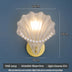 Modern wall lamp with frosted glass shade, shell style, indoor lighting
