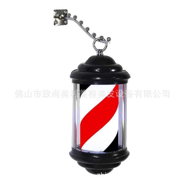 Mini wall light for hair salon, barber shop pole with elegant design and black structure.
