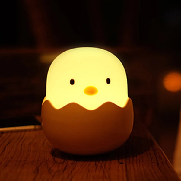 Cute silicone lamp in the shape of a chicken in an eggshell