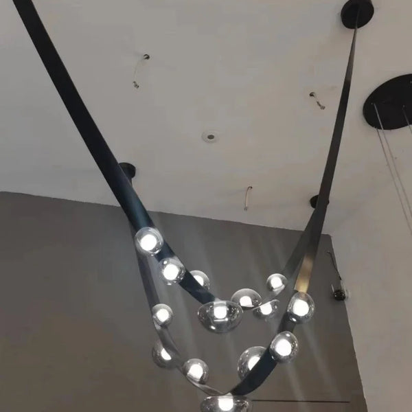 Nordic minimalist LED pendant light in leather and glass