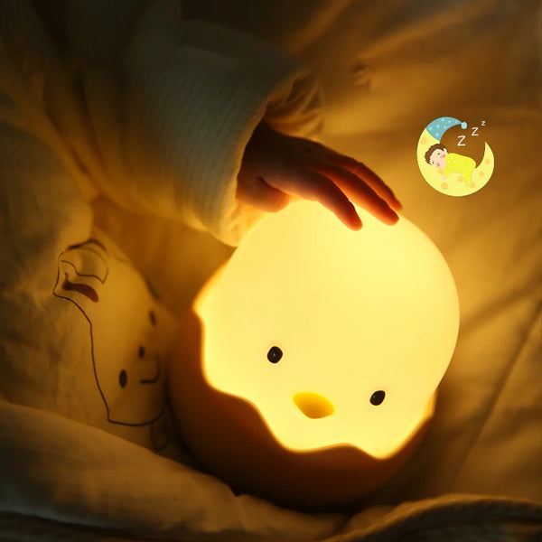 Cute silicone lamp in the shape of a chicken in an eggshell
