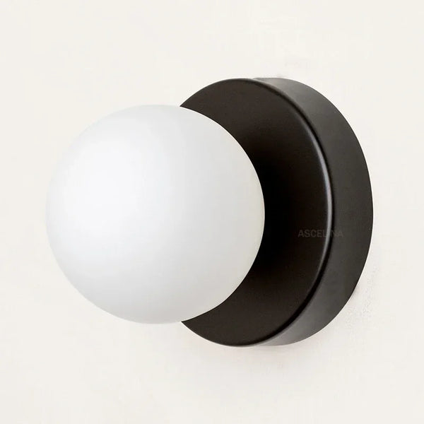 Nordic minimalist glass LED wall light with G9 base, orb style sconce