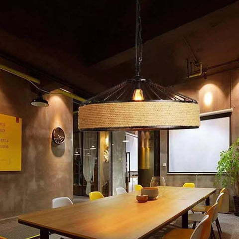 Vintage chandelier with iron cage and hemp rope