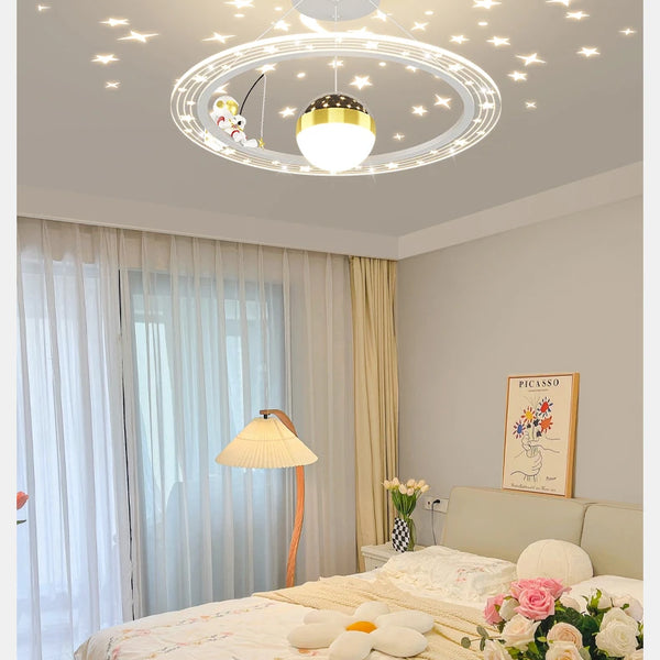Round LED chandelier with astronaut light