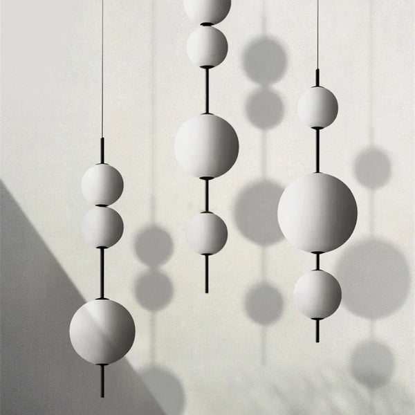 Modern LED pendant light with white glass sphere, interior decoration accessory