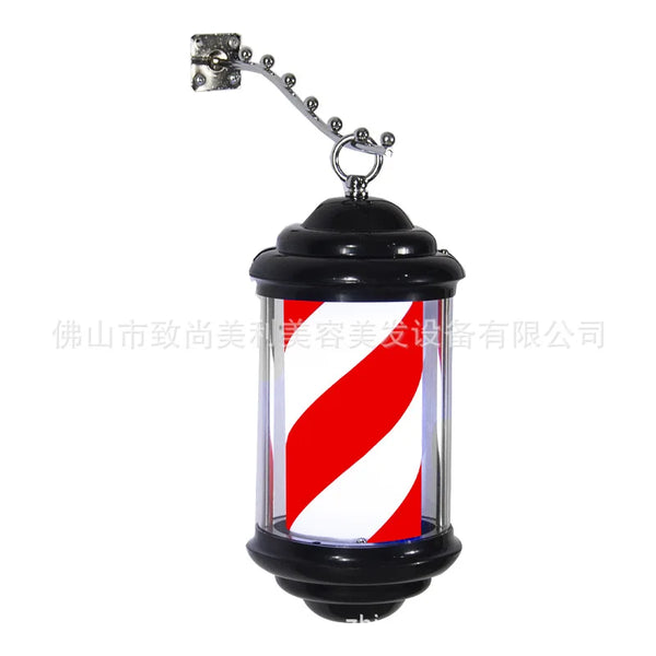 Mini wall light for hair salon, barber shop pole with elegant design and black structure.